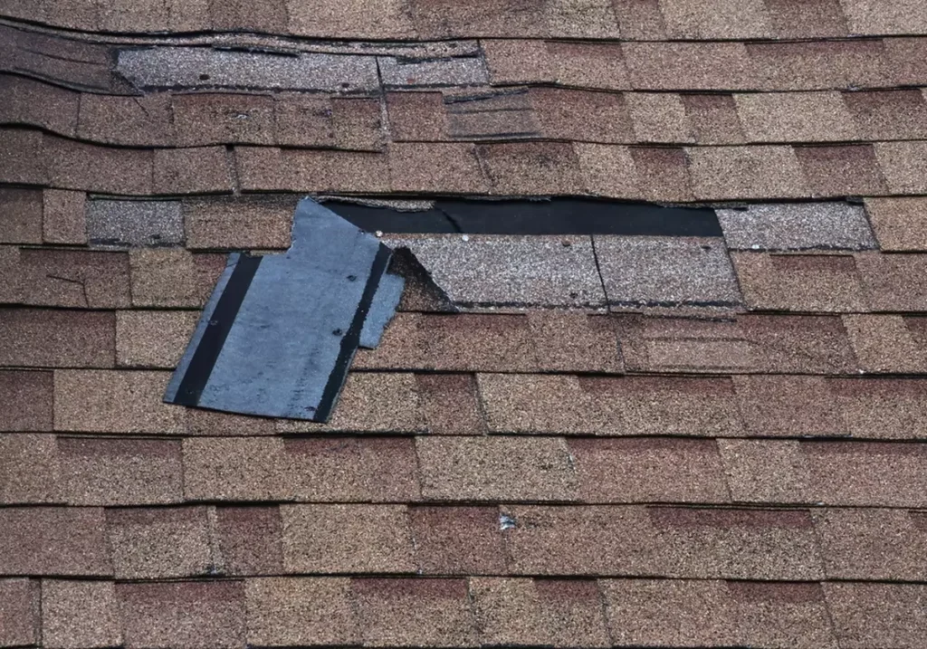 A roof with a missing shingle